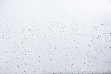 Photo drops of water on the glass