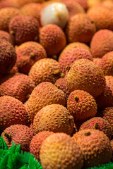 An abundance of lychees for sale on a market stall