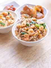 Braised shrimp over rice - Taiwan famous traditional street food. Soy-stewed prawn on cooked rice. Travel concept, top view, copy space, close up