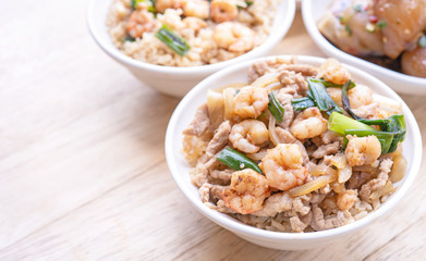 Braised shrimp over rice - Taiwan famous traditional street food. Soy-stewed prawn on cooked rice. Travel concept, top view, copy space, close up