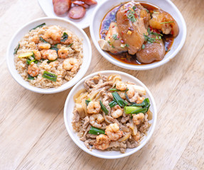Braised shrimp over rice - Taiwan famous traditional street food. Soy-stewed prawn on cooked rice. Travel concept, top view, copy space, close up