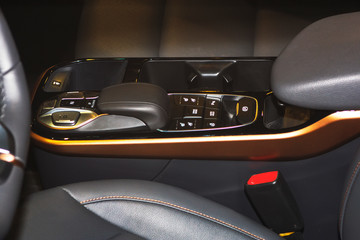 Beautiful new car interior. Vehicle controls panel.