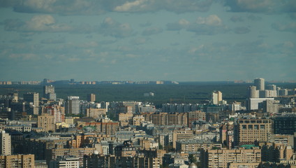 Moscow cityscape, a mixture of buildings against the gray sky at dawn