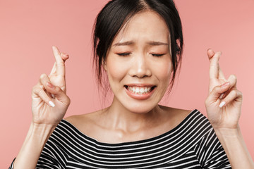 Close up of a smiling cute asian woman