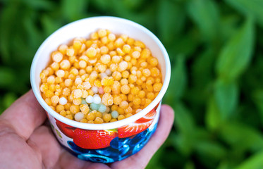 ice cream mini melts small balls, multi-colored ice balls, summer concept, refreshment in summer