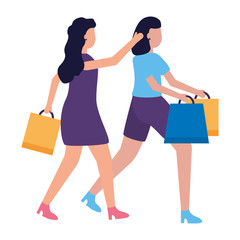 two women holding shopping bags