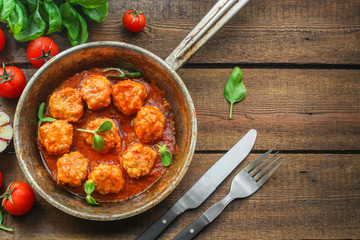 meatballs in tomato sauce (meat dish). food background. top view. copy space