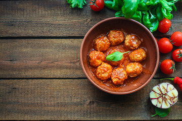 meatballs in tomato sauce (meat dish). food background. top view. copy space