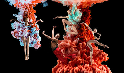 Abstract creative collage formed by color dissolving in water on black background. Bright...