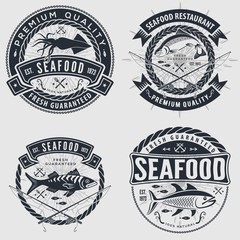 Obraz premium Set of Seafood label, badge, emblem or logo for seafood restaurant, menu design element. Vector illustration