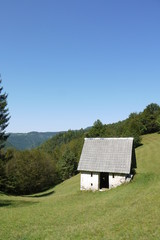 Old wooden hut on the hill