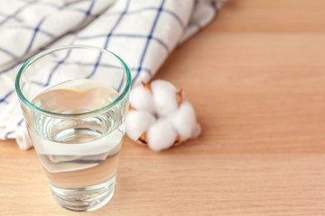 Glass of pure water on kitchen table