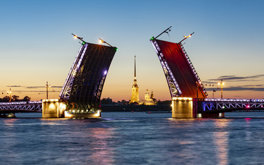 Fototapeta na wymiar Drawn Palace Bridge and Peter and Paul Fortress at summer night, St. Petersburg, Russia
