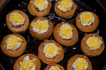 stuffed meat donut on a baking sheet