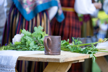 Stein on table with folk symbol league