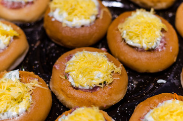 stuffed meat donut on a baking sheet
