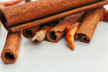 Cinnamon sticks isolated on white background close up