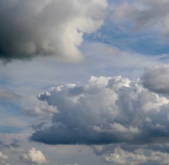 A mix of white and gray clouds in the overcast skies.