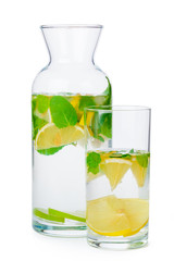 Jug of homemade lemonade isolated on white background