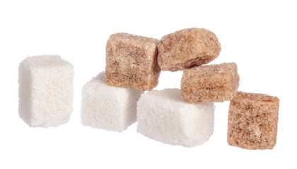 White refined sugar and brown unrefined sugar cubes