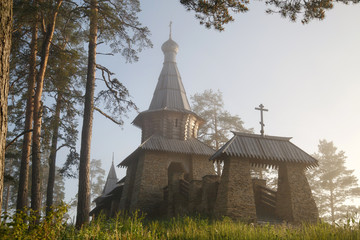 Religious building of a tea house on a foggy morning at dawn near Nikolsky Skete, Valaam Island, Karelia, Russia.