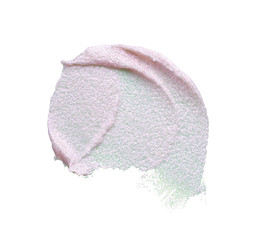 Pearly pink smears and texture of expensive face cream isolated on white background