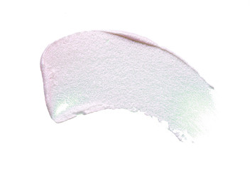 Pearly pink smears and texture of expensive face cream isolated on white background