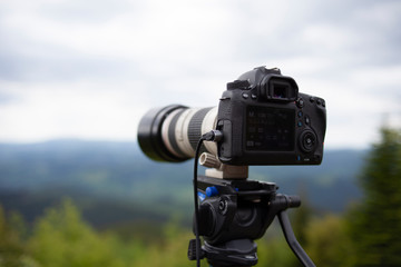 digital camera on tripod