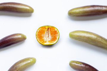 Orange with eggplants on white background.