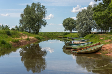 Small Fishing Boats on a Canal at a Lake in Latvia