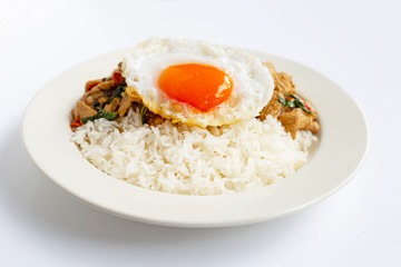 Rice topped with stir-fried chicken and holy basil, fried egg