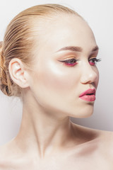 Naklejka premium Portrait of beautiful woman with make up, studio shoot