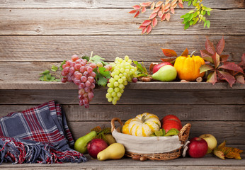 Autumn still life with pumpkins and fruits
