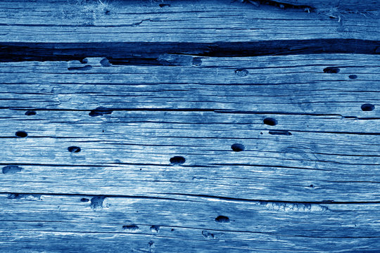 Wooden wall texture in navy blue color.
