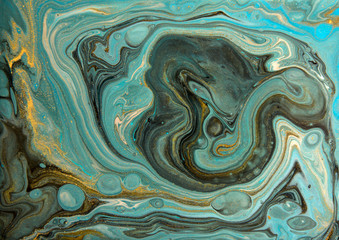 Blue and gold marbling pattern. Golden marble liquid texture.