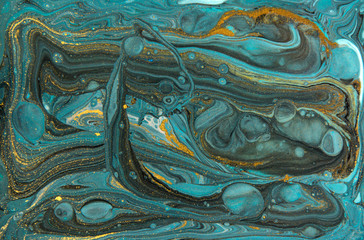 Blue and gold marbling pattern. Golden marble liquid texture.