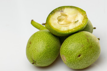 A group of salted walnuts on a white background. Medicinal oreg with high iodine content