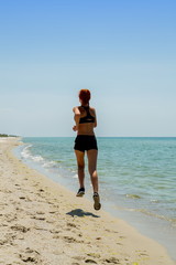 girl running seaside