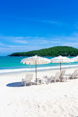 The blue sea with blue sky and clouds ,tropical beach background as summer landscape with beach chairs and beautiful sea view