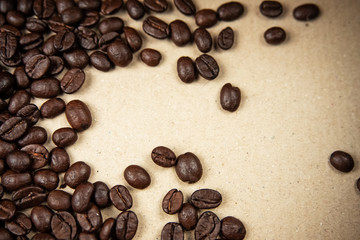 Closeup group of coffee bean on background,blurry light around