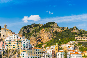 Architecture of Amalfi at sunny day. Italian seaside town on coastline of Tyrrhenian Sea. Summer in Italy