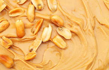 Fototapeta na wymiar Peanut butter or spread and peanuts