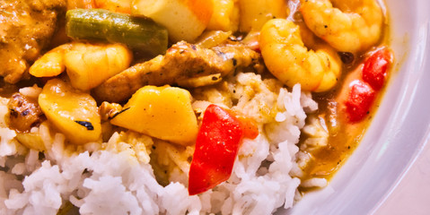 Curry rice in Japanese style with vegetables, shrimps and chilies, food