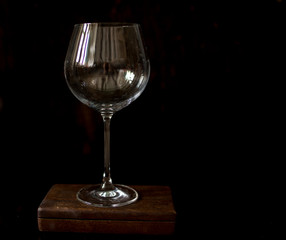 dirty wine glasses on black background