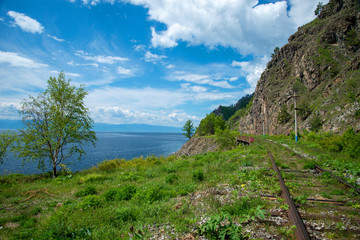 Fototapeta na wymiar Circum-Baikal railway. Nature of Baikal. Travel on Baikal. Iron road. Around Baikal. Paravoz. Around Baikal on paravoze