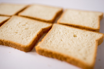 slices of bread on white background