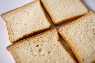 slices of bread on white background