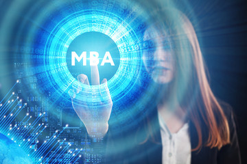 The concept of business, technology, the Internet and the network. A young entrepreneur working on a virtual screen of the future and sees the inscription: MBA