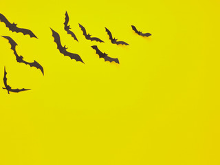 Halloween decorations, bats on a yellow background
