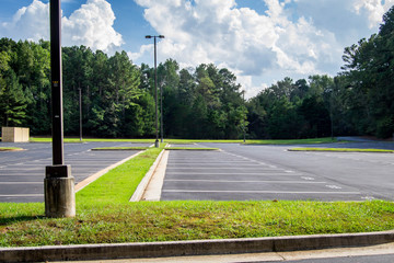 Empty parking lot on sunny day